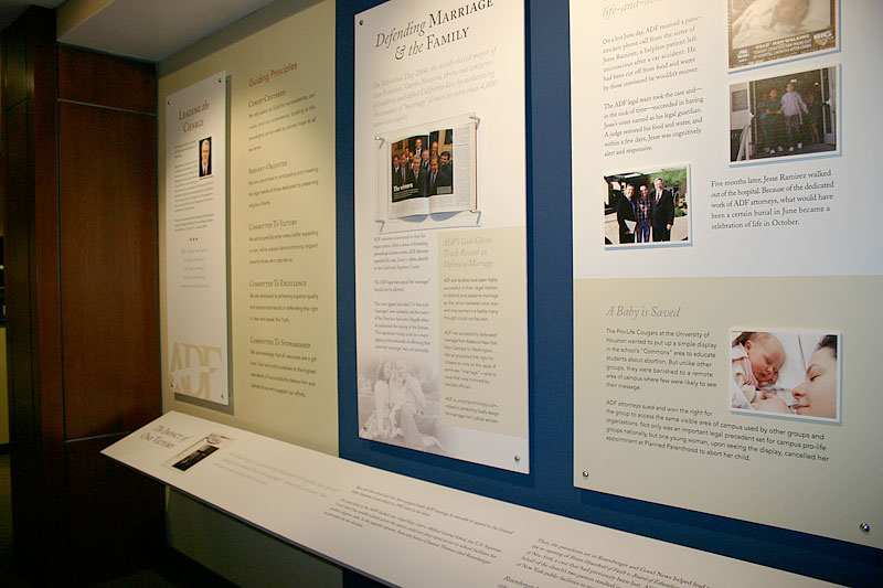 Exhibit design, panel detail with framed book presentation